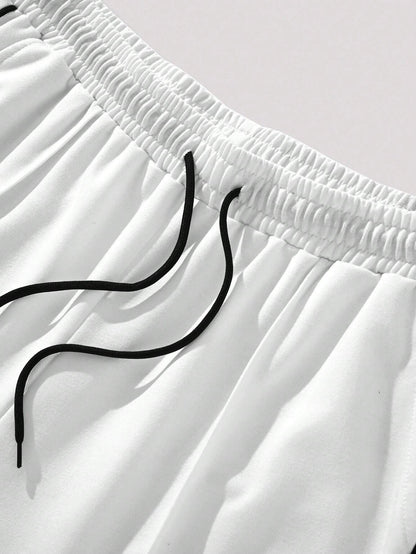 Manfinity Hypemode Men'S Loose Fit Sweatpants with Patch Detail and Drawstring Waist Straight Leg Long Sweat Pants Going Out Casual Boyfriend Gift